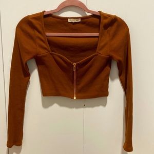 Burnt orange crop top from PacSun